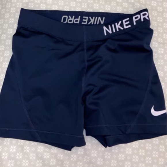 navy blue nike pros shorts